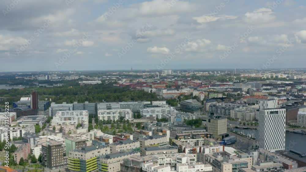 Slow aerial pan high above the port city of Helsinki, Finland. Slow aerial pan high above the port city of Helsinki, Finland.