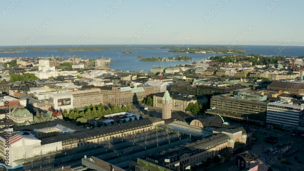 Rising aerial view above the city of Helsinki, Finland at golden hour. Rising aerial view above the city of Helsinki, Finland at golden hour.