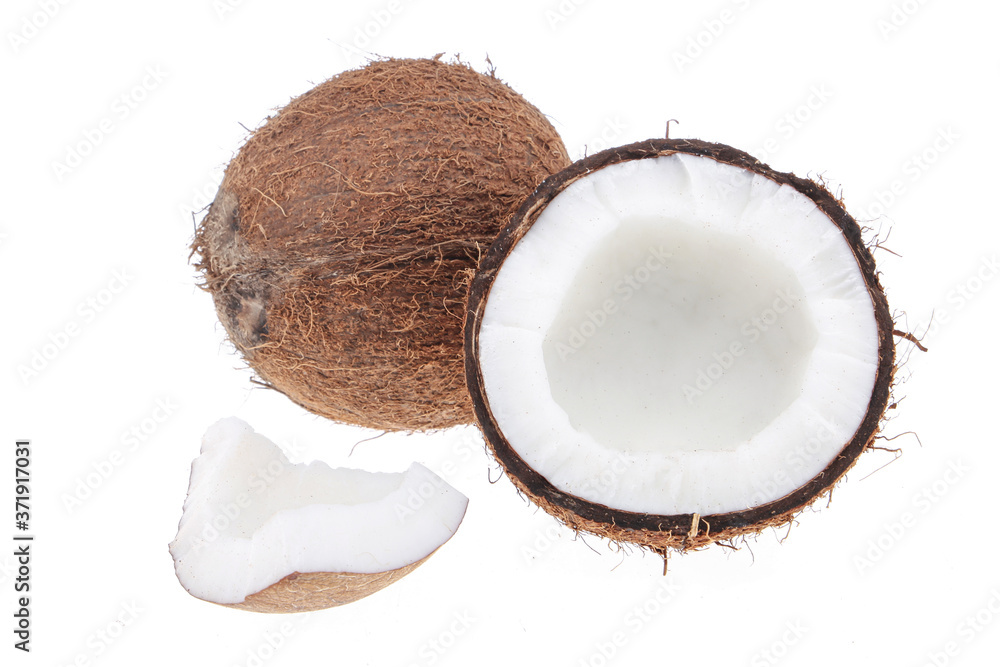 Fresh raw coconut with palm leaves isolated on white background. High resolution image Fresh raw coconut with palm leaves isolated on white background. High resolution image