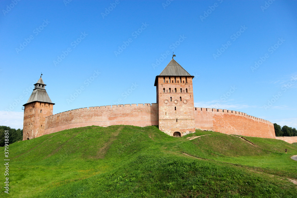 View to Palace tower of the Velikiy (Great) Novgorod citadel (kremlin, detinets) in Russia under blue summer sky in the morning 