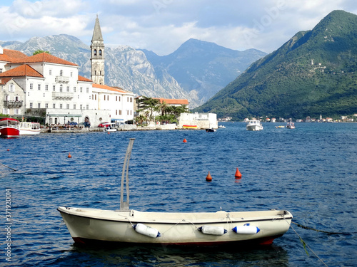 A ship is ankored before Perast old town central in Perast, Montenegro. Perast is an old town on the Bay of Kotor in Montenegro. © isparklinglife