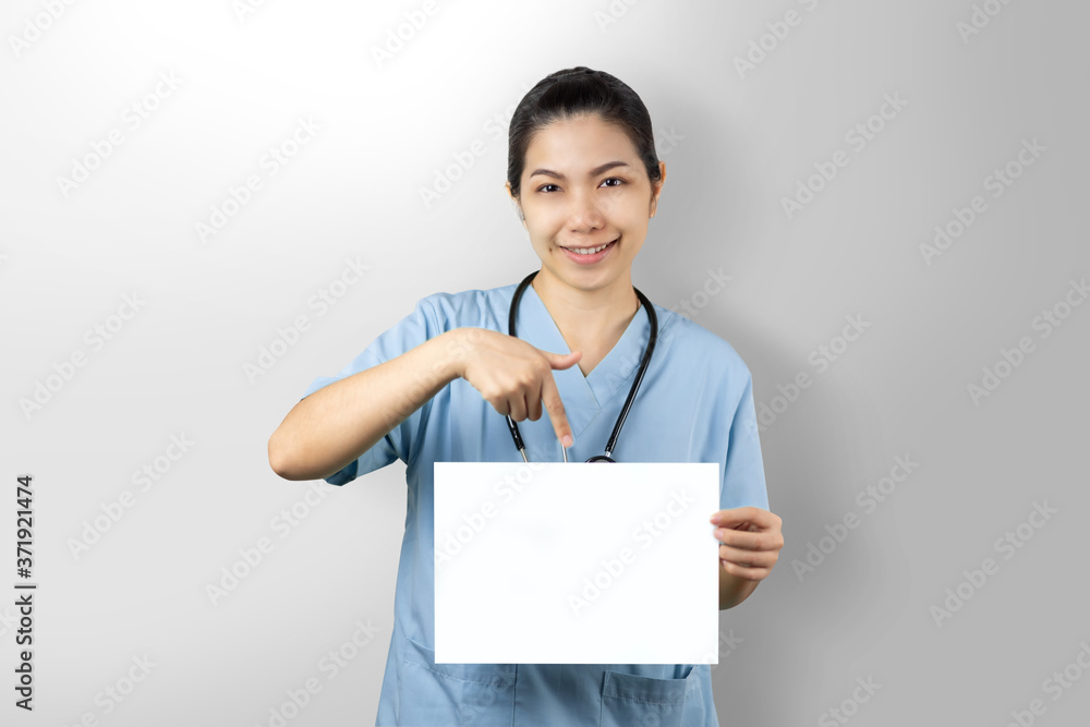 Portrait friendly Doctor woman holding pointing on blank paper sheet Portrait friendly Doctor woman holding pointing on blank paper sheet