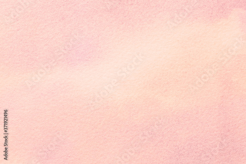 Abstract art background light pink and coral colors. Watercolor painting on canvas with soft rose gradient.