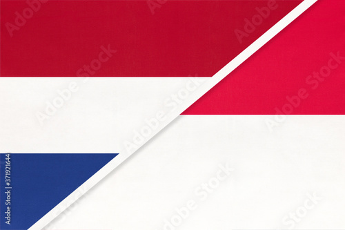 Free Download Netherlands or Holland and Monaco, symbol of national flags from textile. Championship between two countries. - GFXLoad