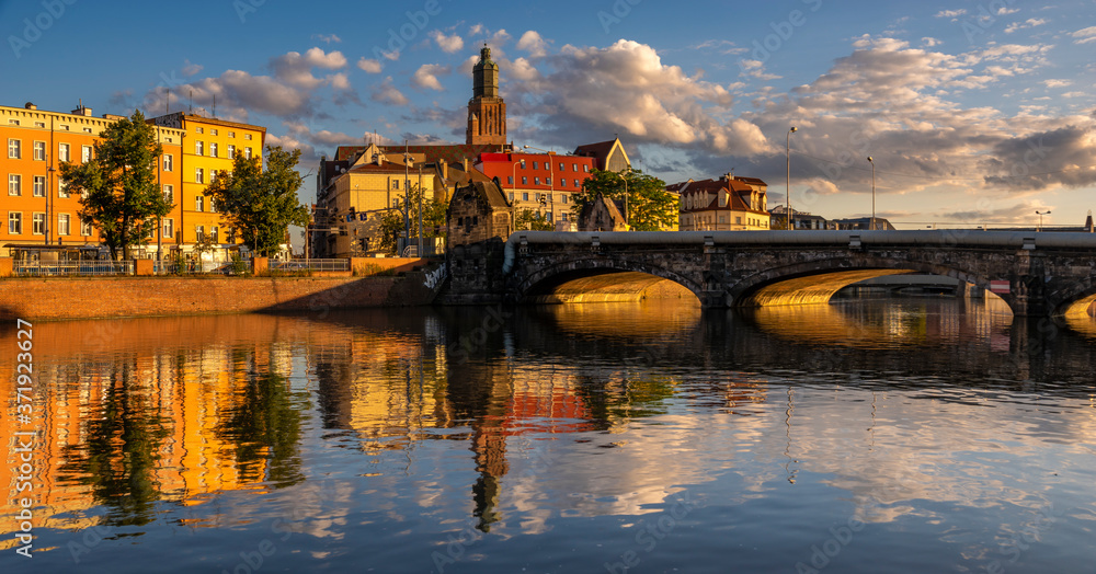 Panorama of the historic district of Wrocław seen from the water in the golden hour