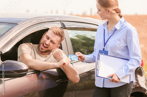 Man getting driver licence ...