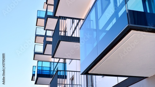 Architectural details of modern apartment building. Modern european residential apartment building complex.