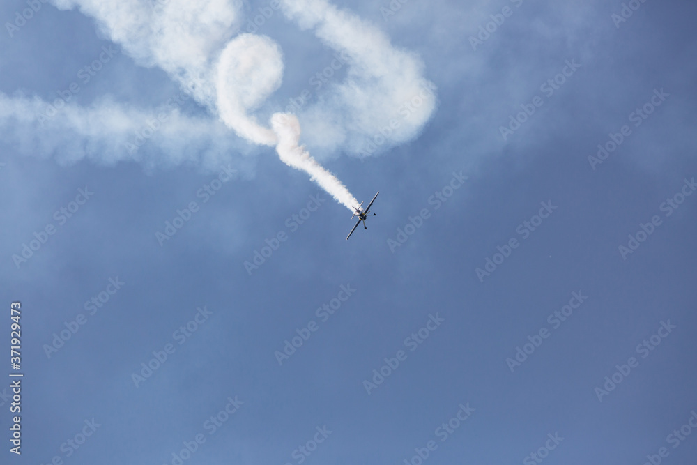 City Riga, Latvia. Avio show in honor of the city festival. Pilots show demonstrations with aircraft. City Riga, Latvia. Avio show in honor of the city festival. Pilots show demonstrations with aircraft.