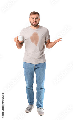Stressed young man with cof...