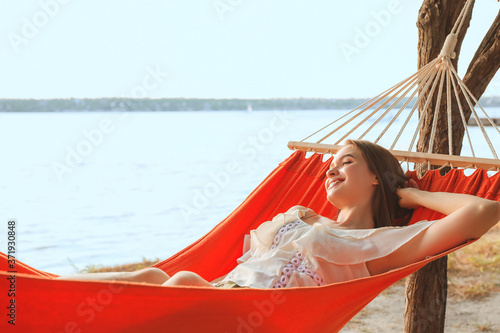 Young woman relaxing in ham...