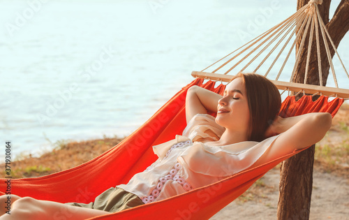 Young woman relaxing in ham...