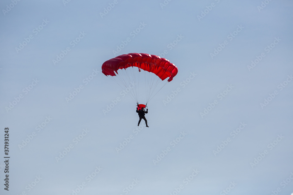 City Riga, Latvian republic. Parachutists land with parachutes on target. City Riga, Latvian republic. Parachutists land with parachutes on target.