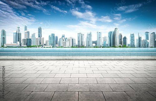 Panoramic view of city waterfront skyline with empty floor