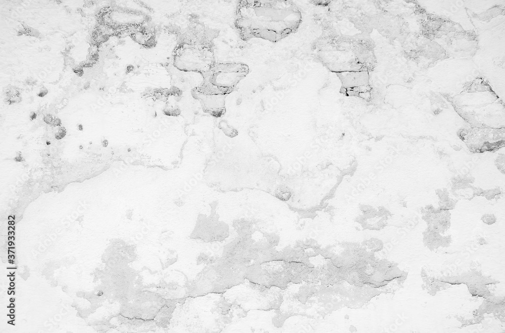 Obraz premium The black and white concept of an old brick wall with plastered and cracked surface that is used for the background, Old stucco light gray and paint white brick wall, Old white walls.