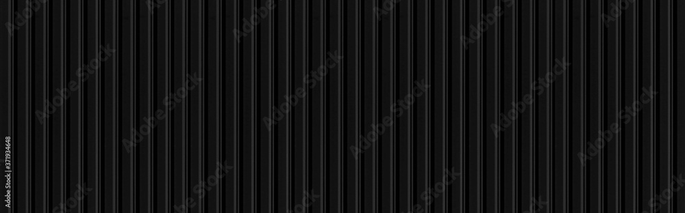 Panorama of Black Corrugated metal background and texture surface or galvanize steel Panorama of Black Corrugated metal background and texture surface or galvanize steel