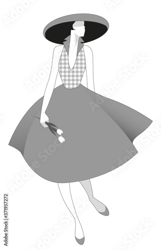 Elegant girl dressed in the style of the 50s, wearing a hat and a bouquet of wheat ears and tulips