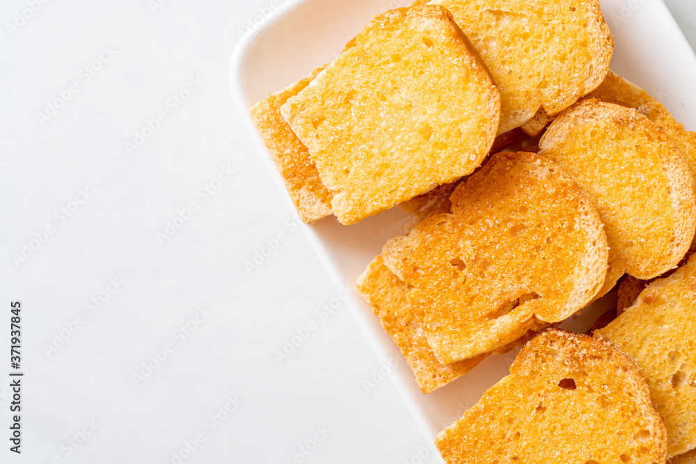 baked crispy bread with butter and sugar baked crispy bread with butter and sugar