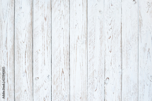 surface of white wood boards worn in vertical position. for vintage backgrounds, wedding invitations, spring motifs and backgrounds or Christmas cards