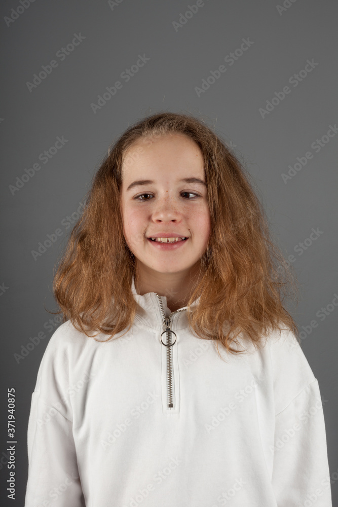 Cute teenage blond girl with slanting eyes Cute teenage blond girl with slanting eyes