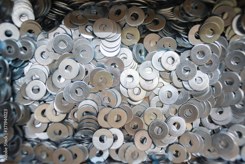 Many washers in the box top view background.