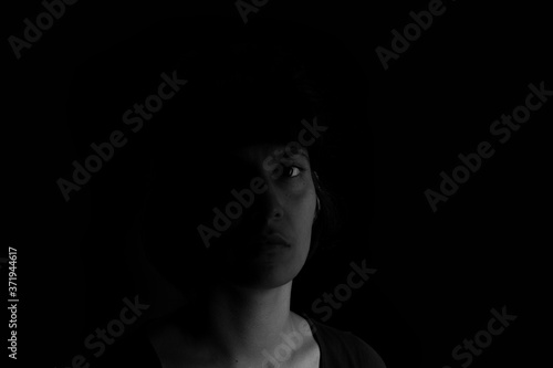 Dramatic black and white portrait of an indian girl