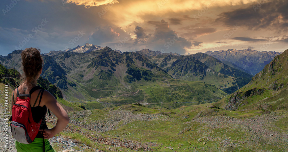 Fototapeta premium young woman looking Col du tourmalet in the french Pyrenees