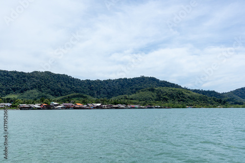 Typical sea in Thailand with blue cloudy sky in normal day. © Sevendeman