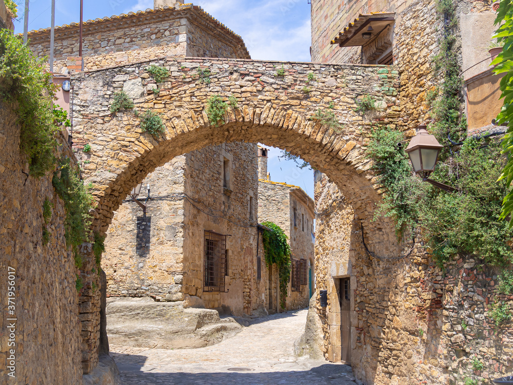 Medieval architecture street in Peratallada town in Catalonia, Spain