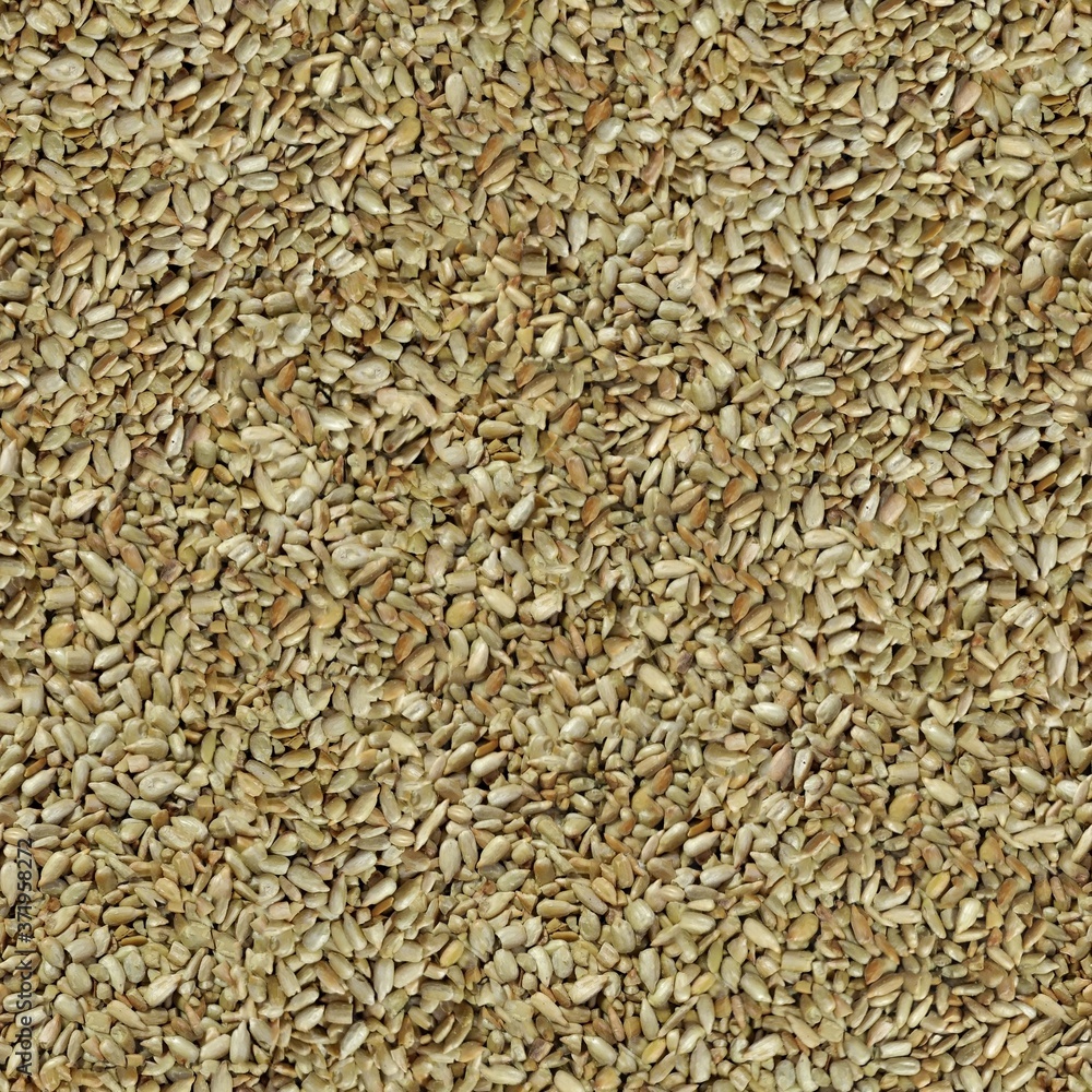 close up of a pile of cumin seeds close up of a pile of cumin seeds