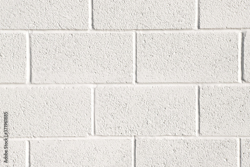 Close up of white painted concrete block wall background texture