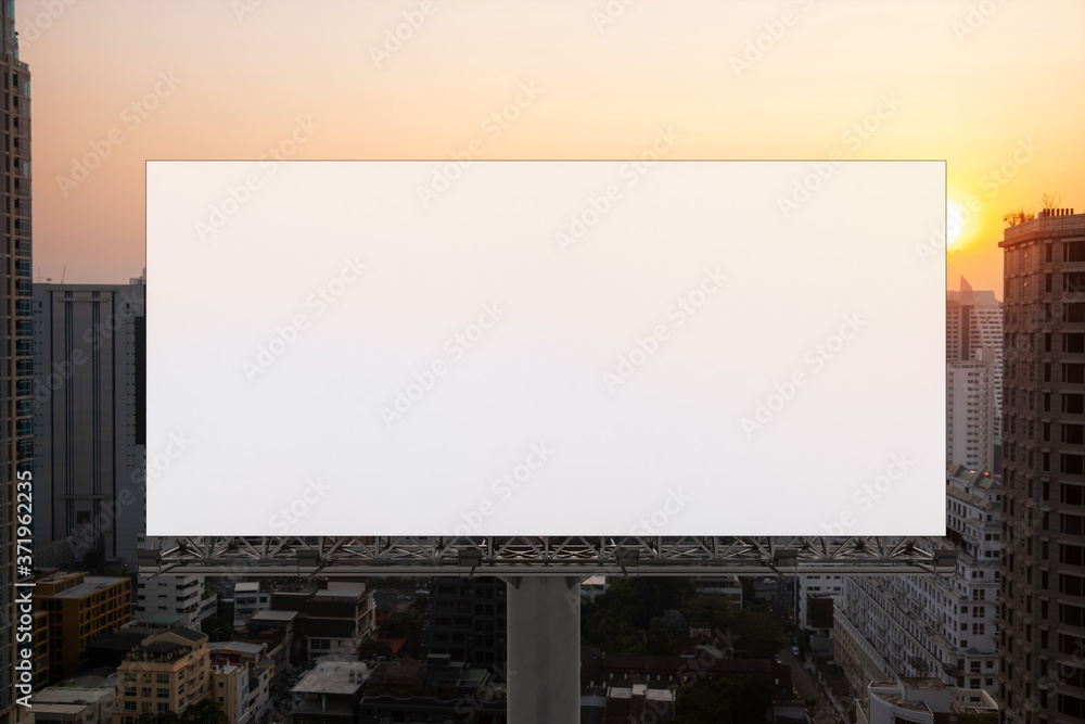 Blank white road billboard with Bangkok cityscape background at sunset. Street advertising poster, mock up, 3D rendering. Front view. The concept of marketing communication to promote or sell idea. Blank white road billboard with Bangkok cityscape background at sunset. Street advertising poster, mock up, 3D rendering. Front view. The concept of marketing communication to promote or sell idea.