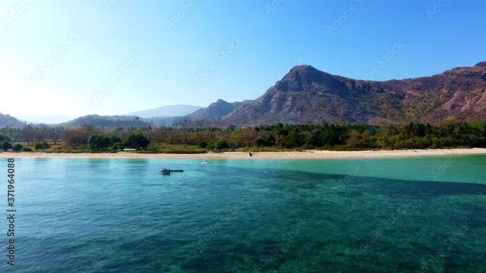 Coral reefs and golden sand beaches of Jelenga Indonesia. Travel concepts. Aerial view. Coral reefs and golden sand beaches of Jelenga Indonesia. Travel concepts. Aerial view.