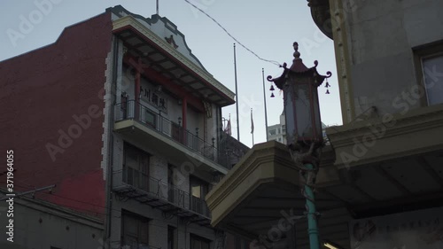 Streetlight in Chinatown in San Francisco California Chinese and US flag.