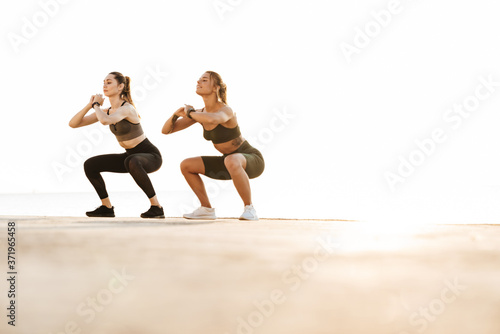 Fitness sports women friends outdoors © Drobot Dean