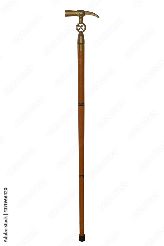 Hand stick with decorated brass handle of a German miner from the Ruhr area, isolated Hand stick with decorated brass handle of a German miner from the Ruhr area, isolated