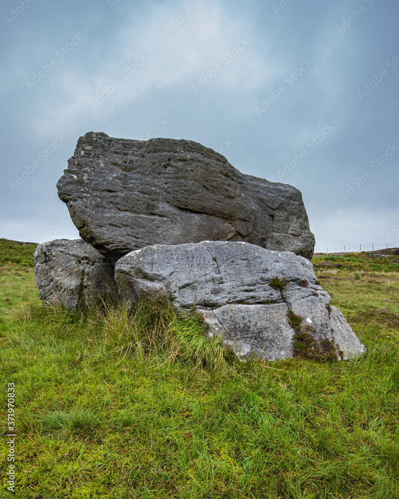 The mythical stones on Craigmaddie Muir, The Auld Wives Lift are a mysterious collection of rocks and capstone on the remote moorland covered in rock carvings and victorian graffiti