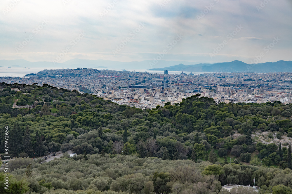 View over Athens looking towards the port of Piraeus, Greece
