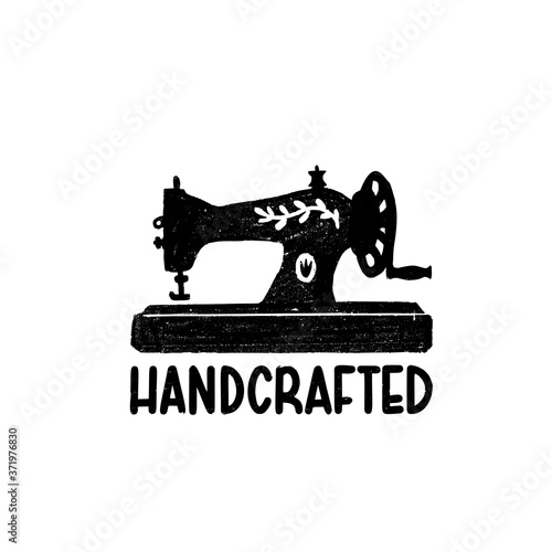 Handcrafted icon or logo. Vintage stamp icon with a retro sewing machine and hand crafted inscription.