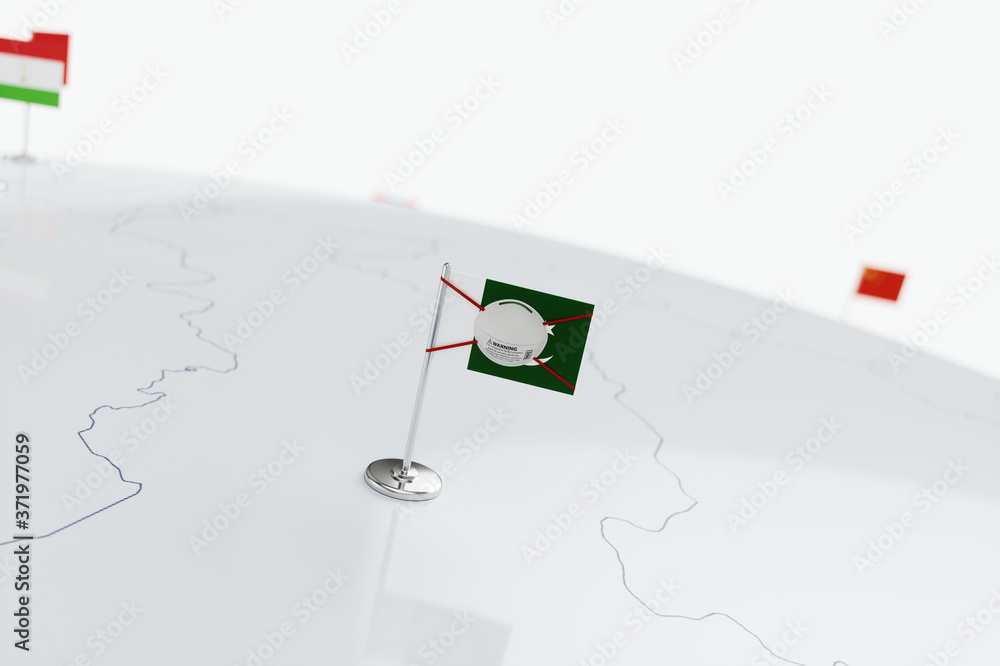 Fototapeta premium Coronavirus medical surgical face mask on the Pakistani national flag