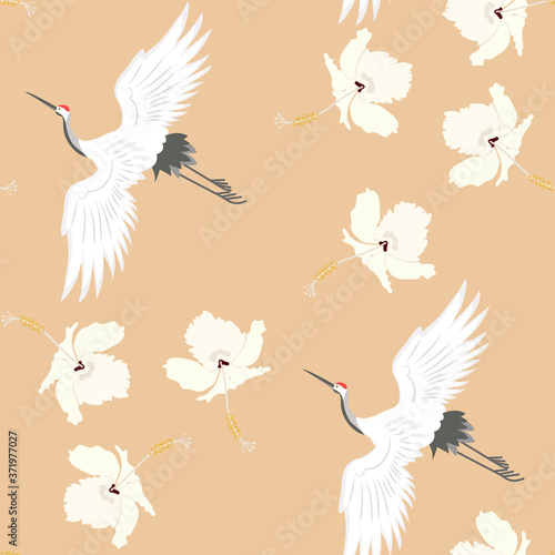Seamless vector illustration with birds cranes and hibiscus flowers