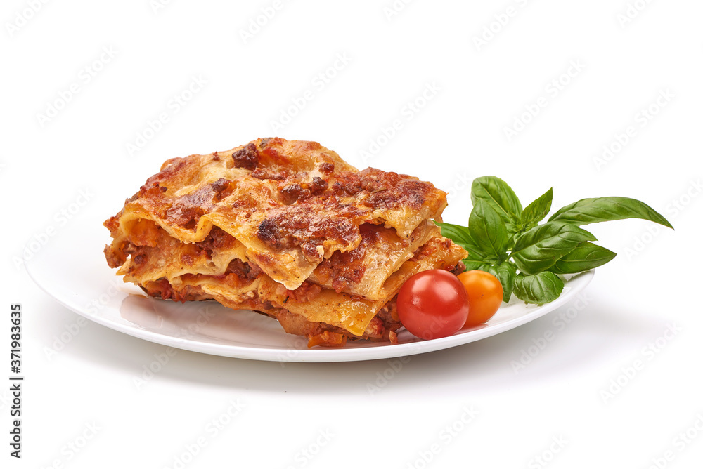 Lasagna, Traditional homemade italian dish, isolated on white background Lasagna, Traditional homemade italian dish, isolated on white background