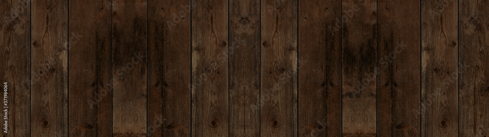 Naklejka premium old brown rustic dark wooden texture - wood background panorama long banner 