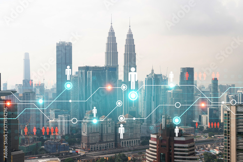 Canvas Print Social media icons hologram over panorama city view of Kuala Lumpur, Malaysia, Asia