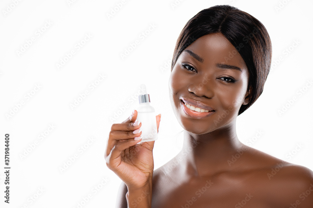 naked african american woman with bottle of serum isolated on white naked african american woman with bottle of serum isolated on white