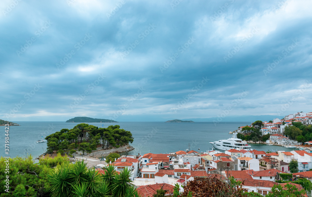 Skiathos island, Greece - panoramic view of the old port, on a cloudy summer day