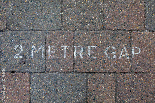 Social Distancing Message on the Pavement