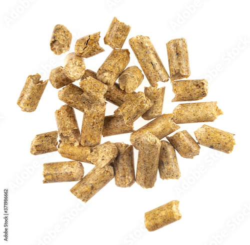 Cuadro en lienzo Brown wood pellets  isolated white background