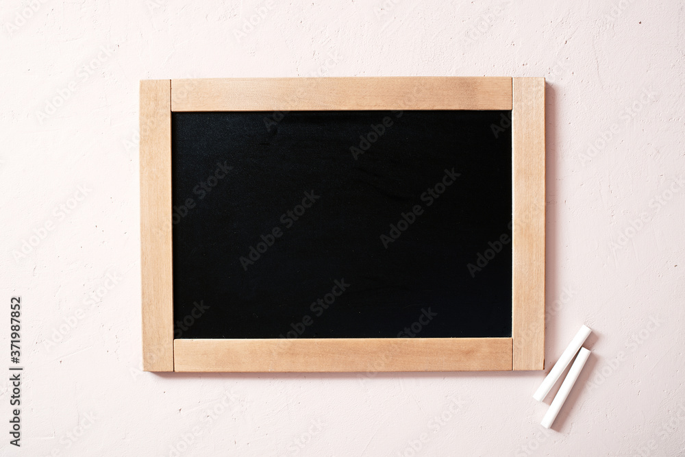 Background with chalkboard and chalk, overhead view Background with chalkboard and chalk, overhead view