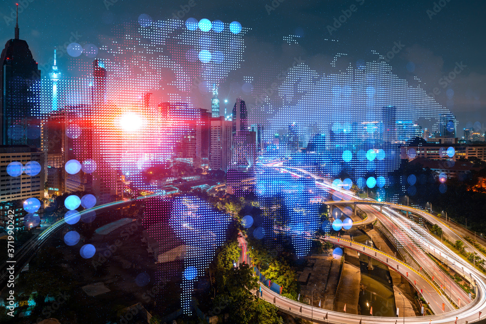 Obraz premium Hologram of Earth planet map on night panoramic cityscape of Kuala Lumpur, Malaysia, Asia. The concept of international companies in KL. Multi Exposure.