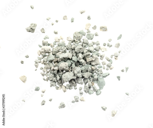 Fotografie Gray small rocks ground texture isolated white background